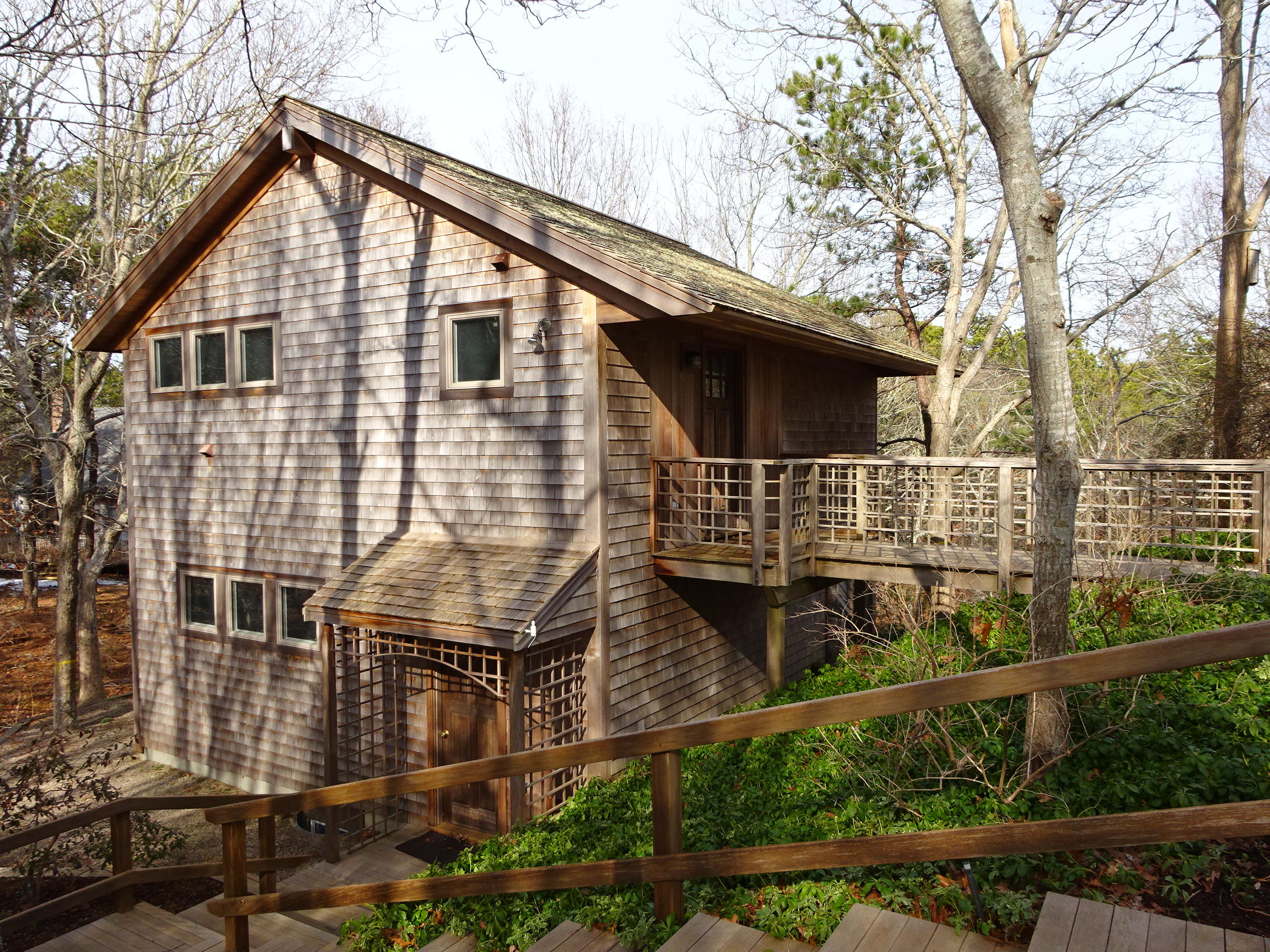 225 Long Pond Road Wellfleet, MA 02667 - Photo 29 of 35 a backyard of a house with lots of green space