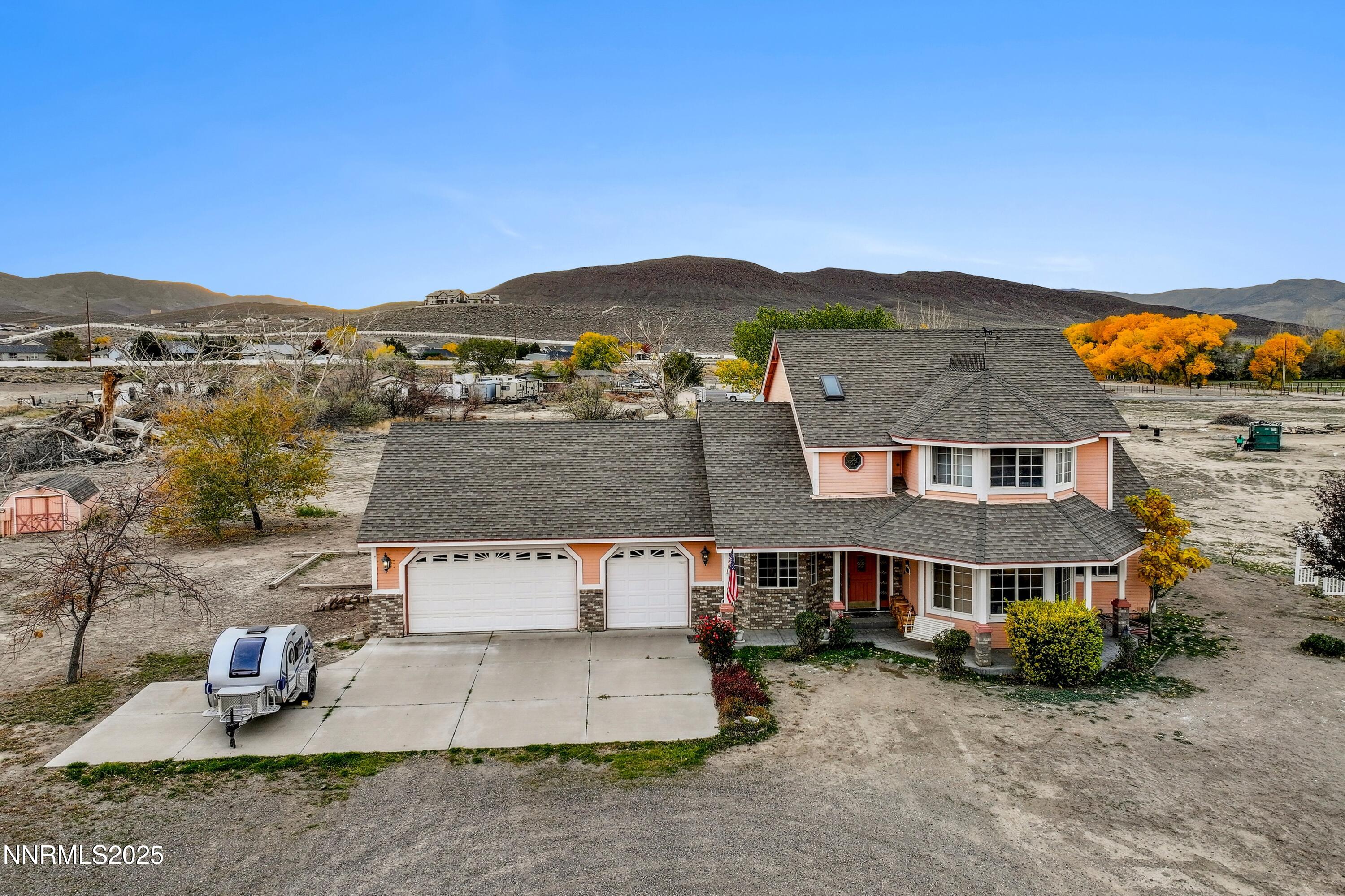 955 Carol Way Fernley, NV 89408 - Photo 1 of 42 an aerial view of a house