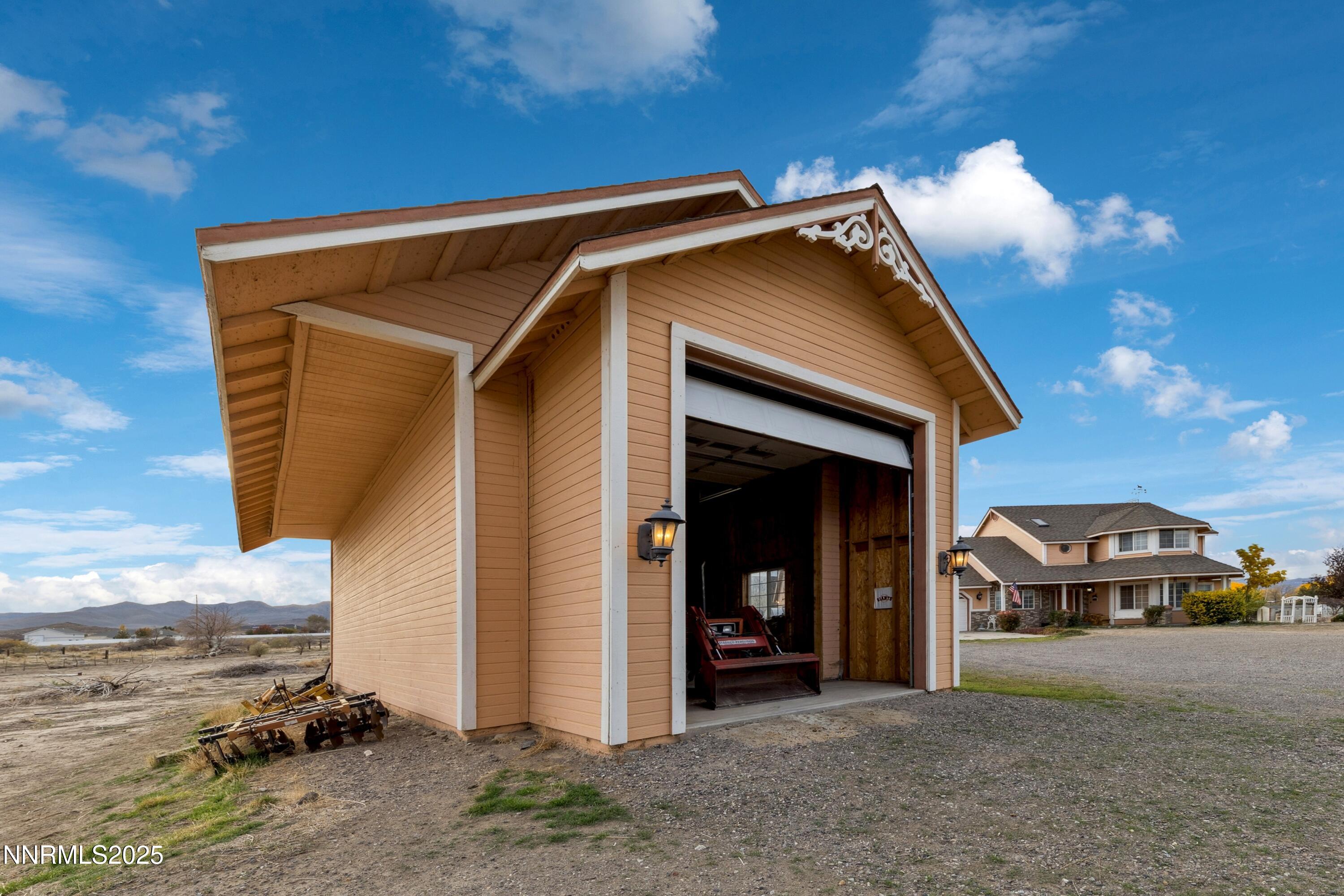955 Carol Way Fernley, NV 89408 - Photo 3 of 42 a view of a car park in front of house