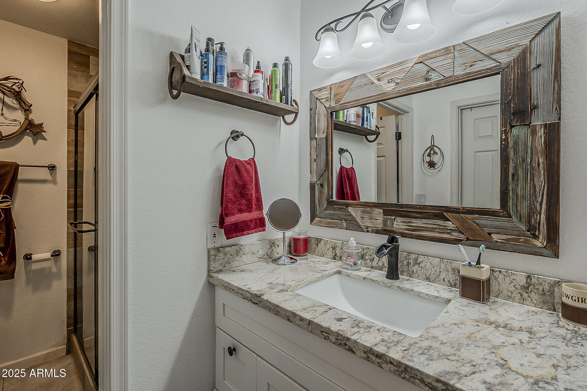 15205 North Ivory Drive, Unit B Fountain Hills, AZ 85268 - Photo 12 of 41 a bathroom with a granite countertop double vanity sink and a mirror