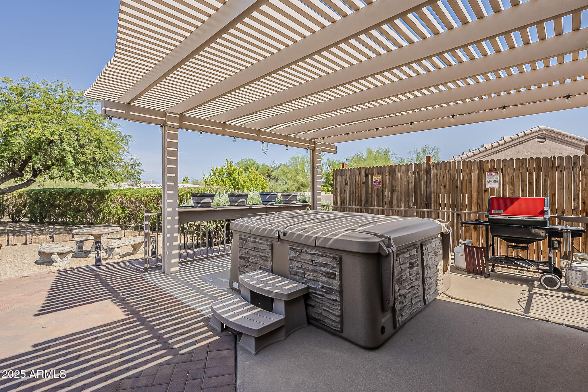 15205 North Ivory Drive, Unit B Fountain Hills, AZ 85268 - Photo 36 of 41 a view of a patio with a table and chairs