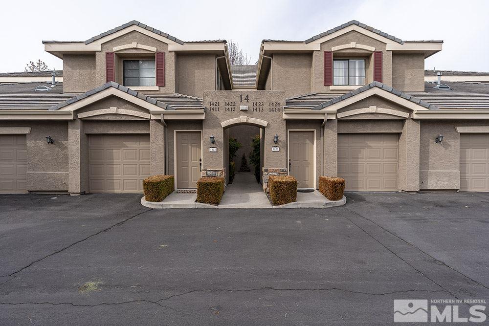 900 South, Unit 1424 Reno, NV 89521 - Photo 1 of 24 a front view of a house with yard