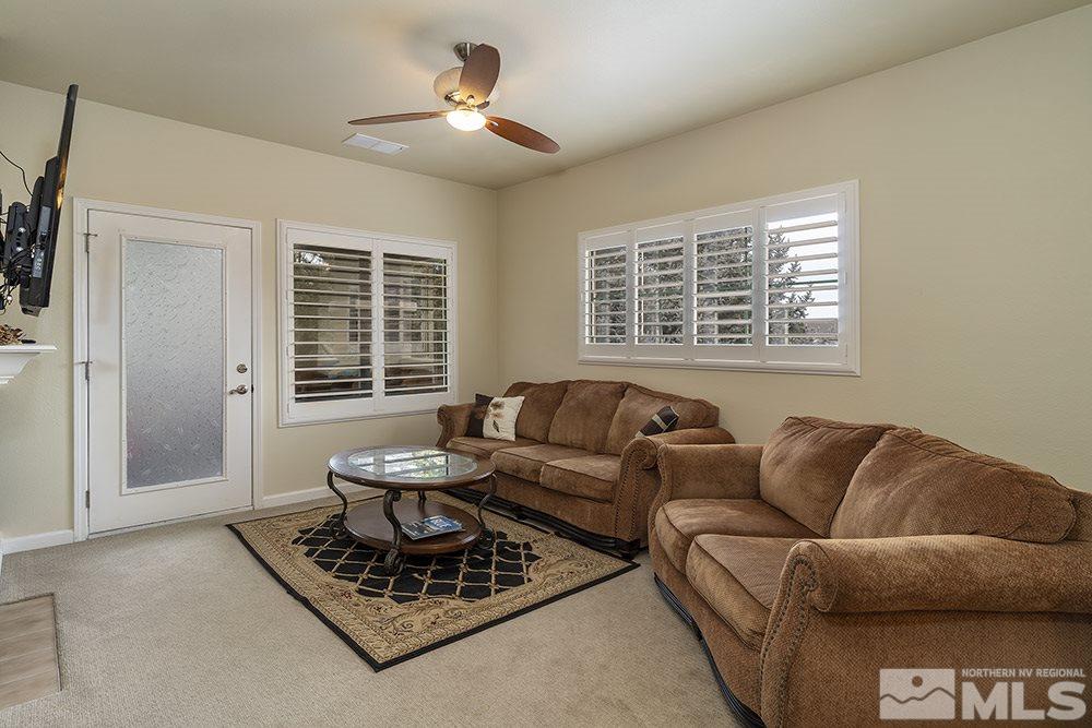 900 South, Unit 1424 Reno, NV 89521 - Photo 6 of 24 a living room with furniture and a large window