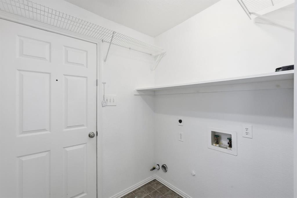5023 Falcon Hollow Road McKinney, TX 75072 - Photo 14 of 25 Laundry room with gas dryer hookup, hookup for a washing machine, and hookup for an electric dryer