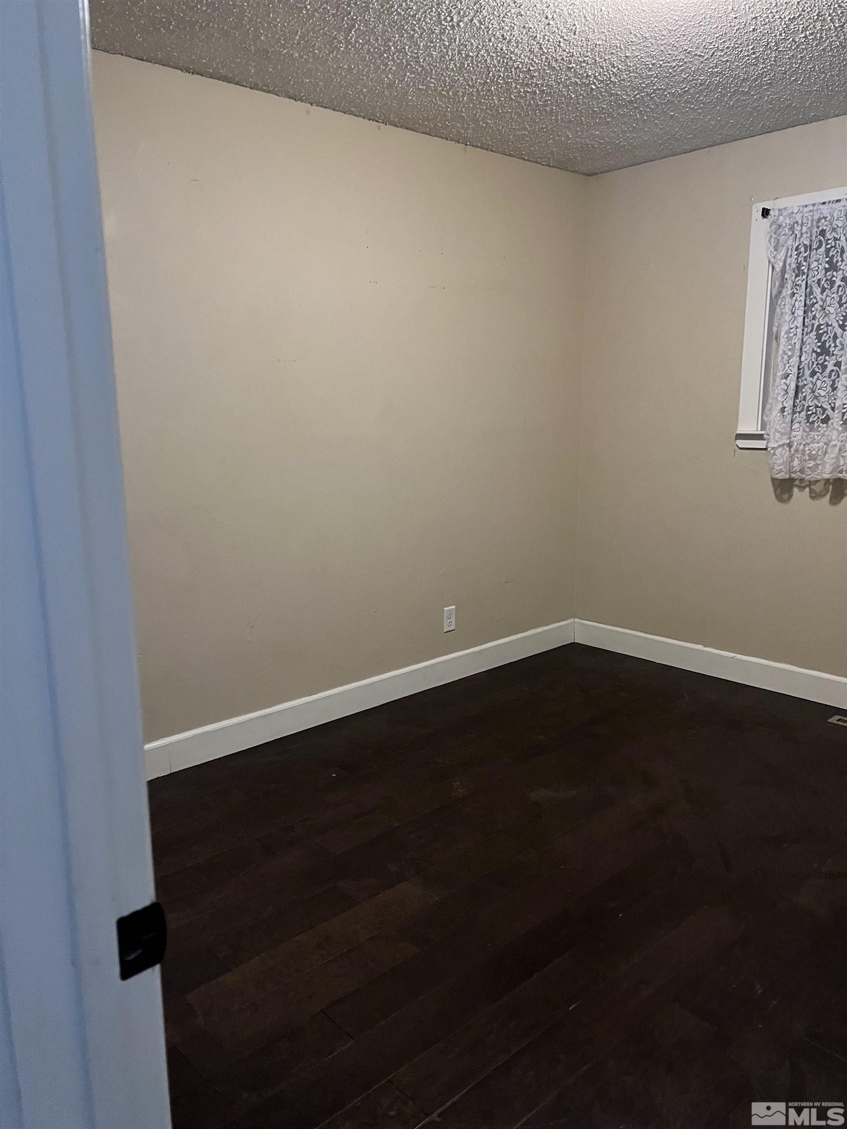 908 Lester Avenue Reno, NV 89502 - Photo 19 of 35 a view of wooden floor