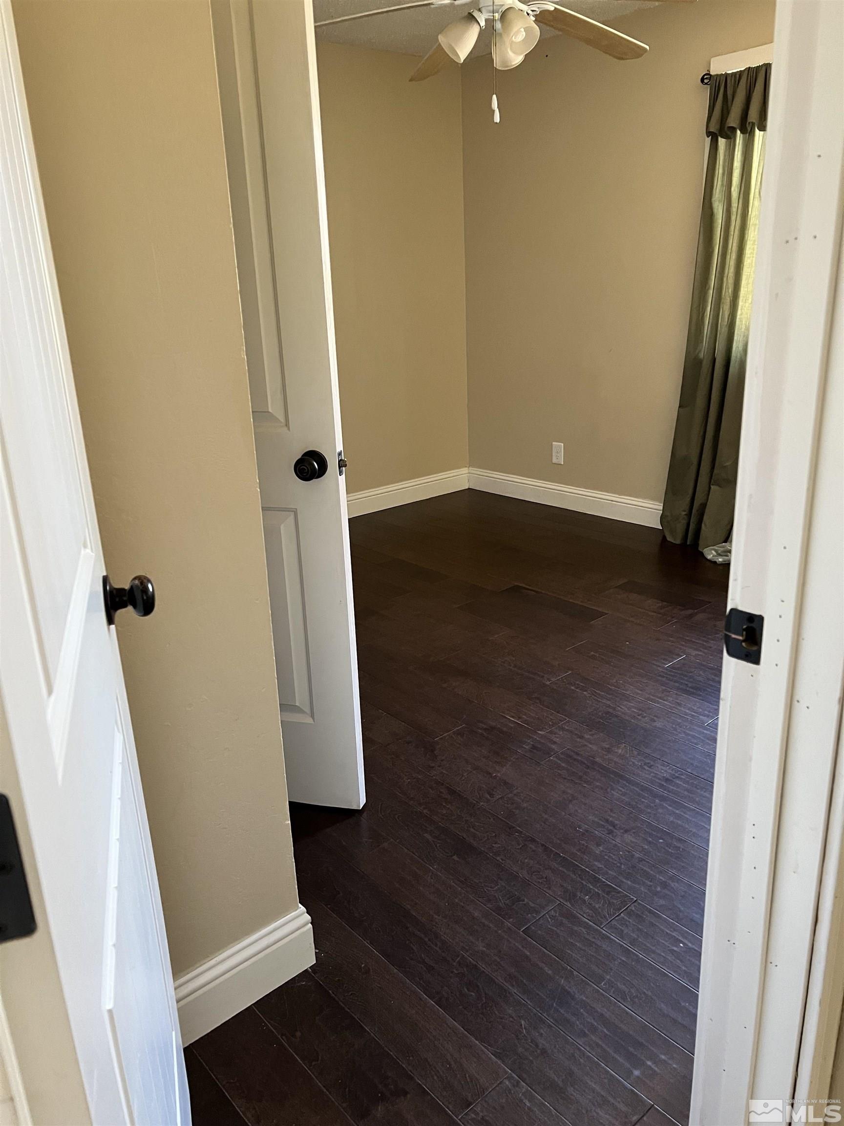 908 Lester Avenue Reno, NV 89502 - Photo 21 of 35 an entryway door with wooden floor