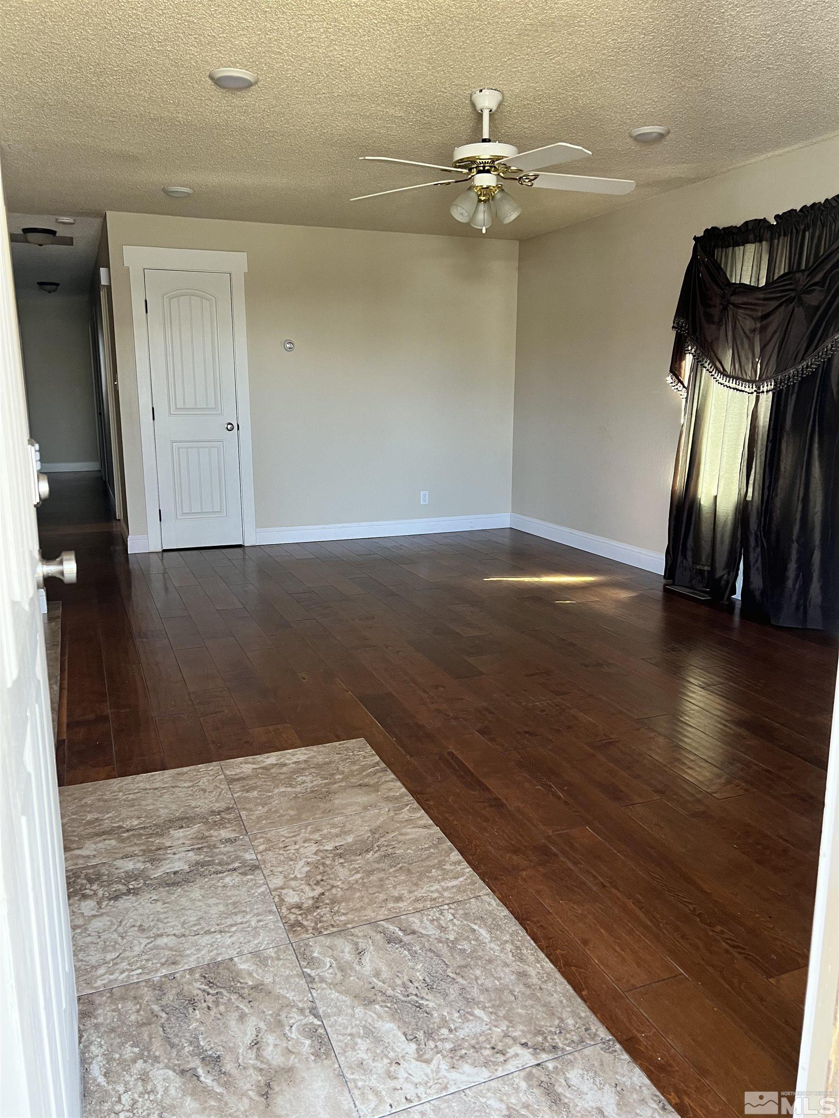 908 Lester Avenue Reno, NV 89502 - Photo 30 of 35 wooden floor in an empty room