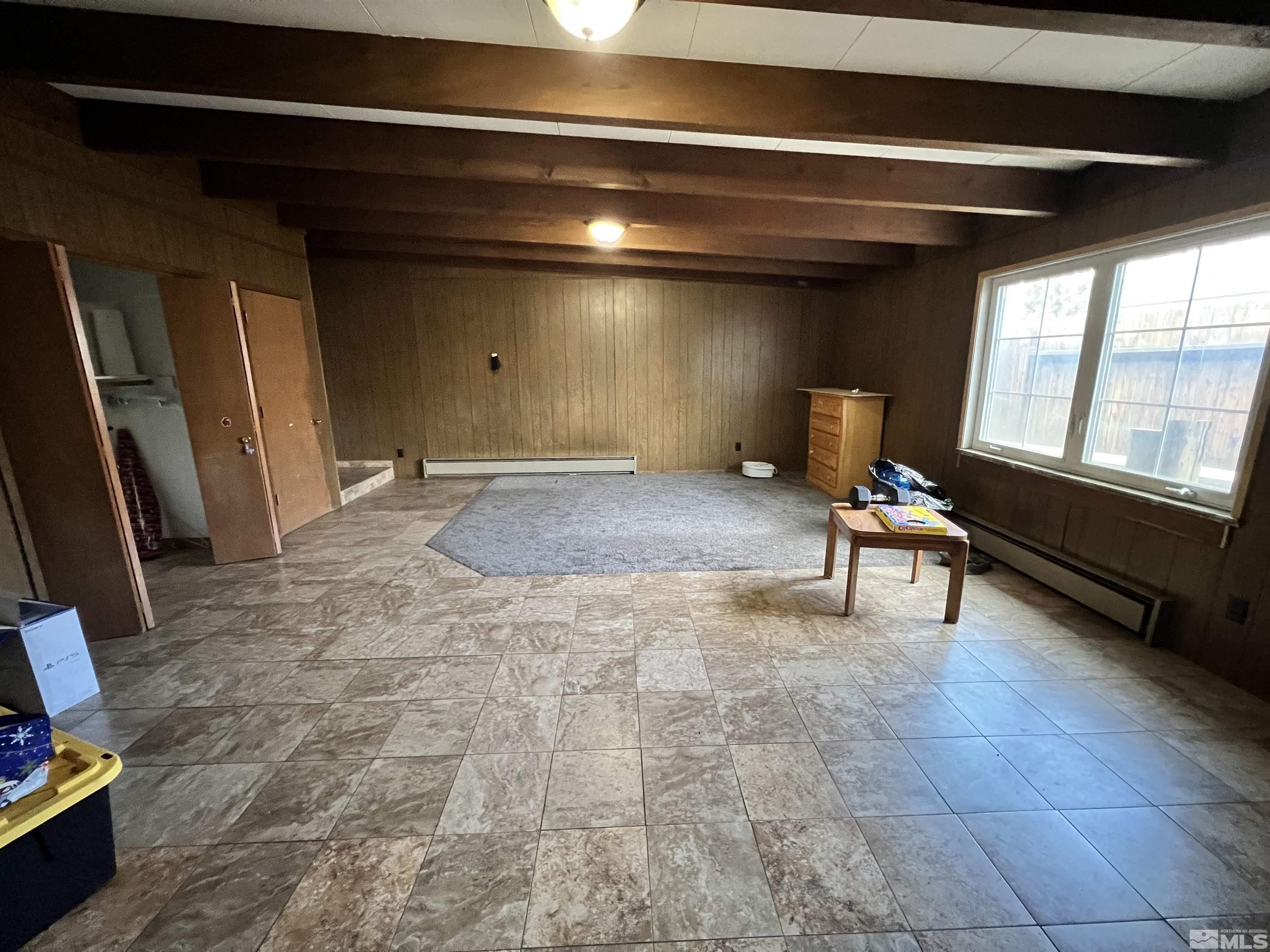 908 Lester Avenue Reno, NV 89502 - Photo 32 of 35 a view of an empty room and fire place