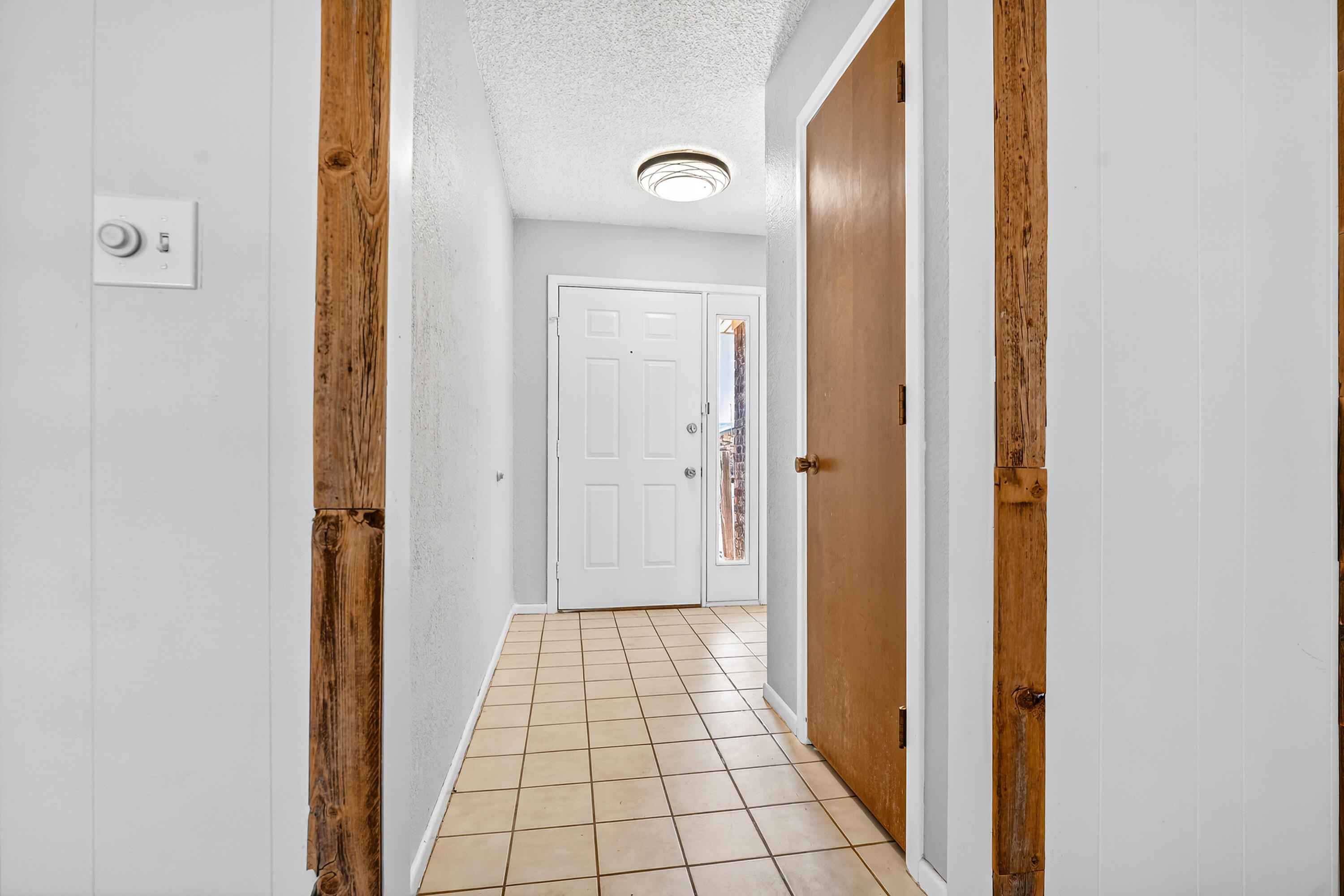 5236 91st Street Lubbock, TX 79424 - Photo 2 of 23 hallway view with wooden floor
