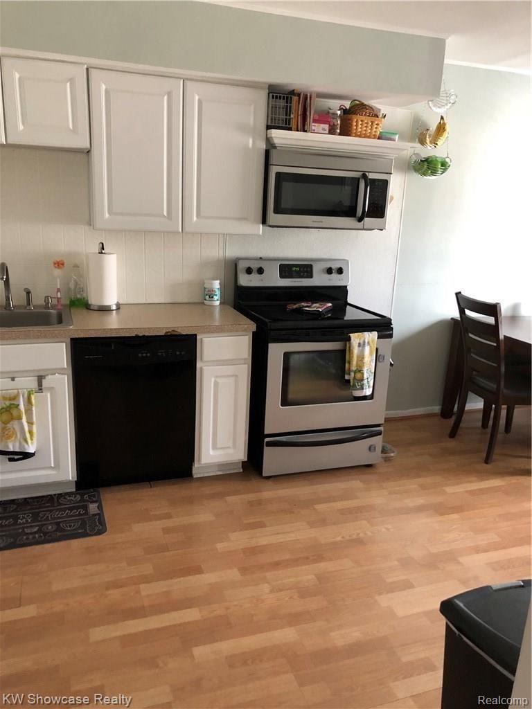 150 Ladd Road, Unit 2 Walled Lake, MI 48390 - Photo 6 of 47 IMG_4104.JPG