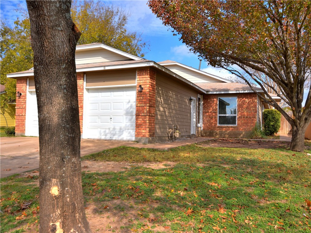 2302 Fuzz Fairway, Unit B Austin, TX 78728 - Photo 4 of 27 Welcome home to 2302 Fuzz Fairway #B! New siding, exterior paint and new windows. Close to Mopac and 35. Just 5-10 minutes from the Domain. Hiking and Biking trails are just a block away!