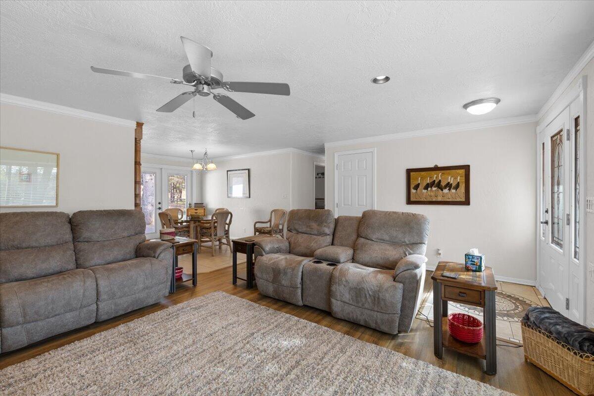 324 China Gulch Road Jacksonville, OR 97530 - Photo 9 of 45 a living room with furniture and a flat screen tv