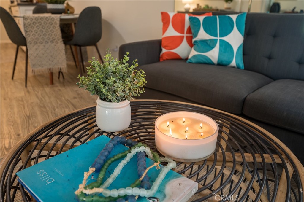 565 Esplanade, Unit 104 Redondo Beach, CA 90277 - Photo 15 of 42 a view of a dining room with furniture and wooden floor