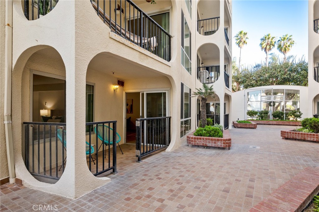 565 Esplanade, Unit 104 Redondo Beach, CA 90277 - Photo 35 of 42 a view of a house with many windows