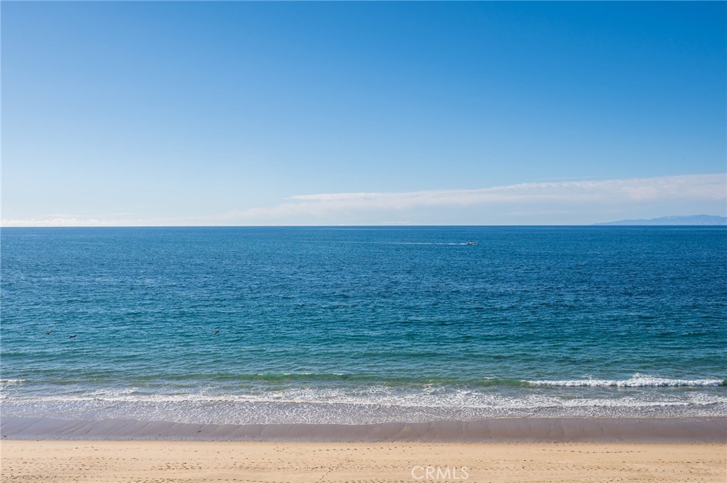 565 Esplanade, Unit 104 Redondo Beach, CA 90277 - Photo 36 of 42 a view of a room with an ocean beach