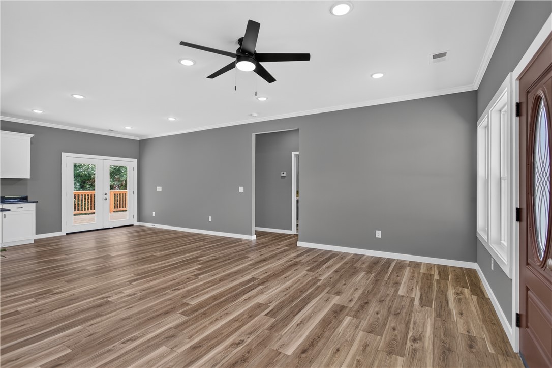223 Maple Drive Anderson, SC 29621 - Photo 3 of 45 Streamlined living with durable flooring and modern overhead lighting.