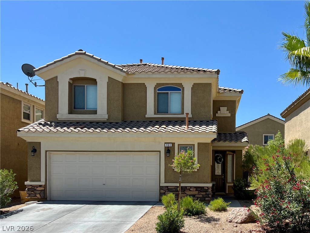151 Short Ruff Way Las Vegas, NV 89148 - Photo 1 of 17 A classic Spanish tile roof and stone accents elevate the exterior of this two-story home.