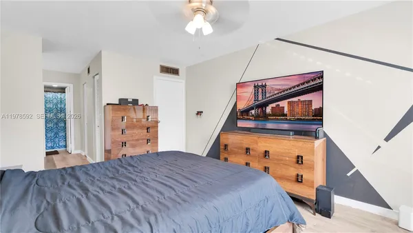 a en suite bathroom with a sink and a mirror