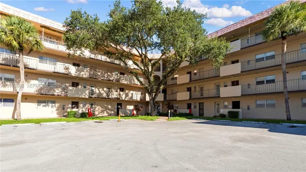 a view of a building with a street