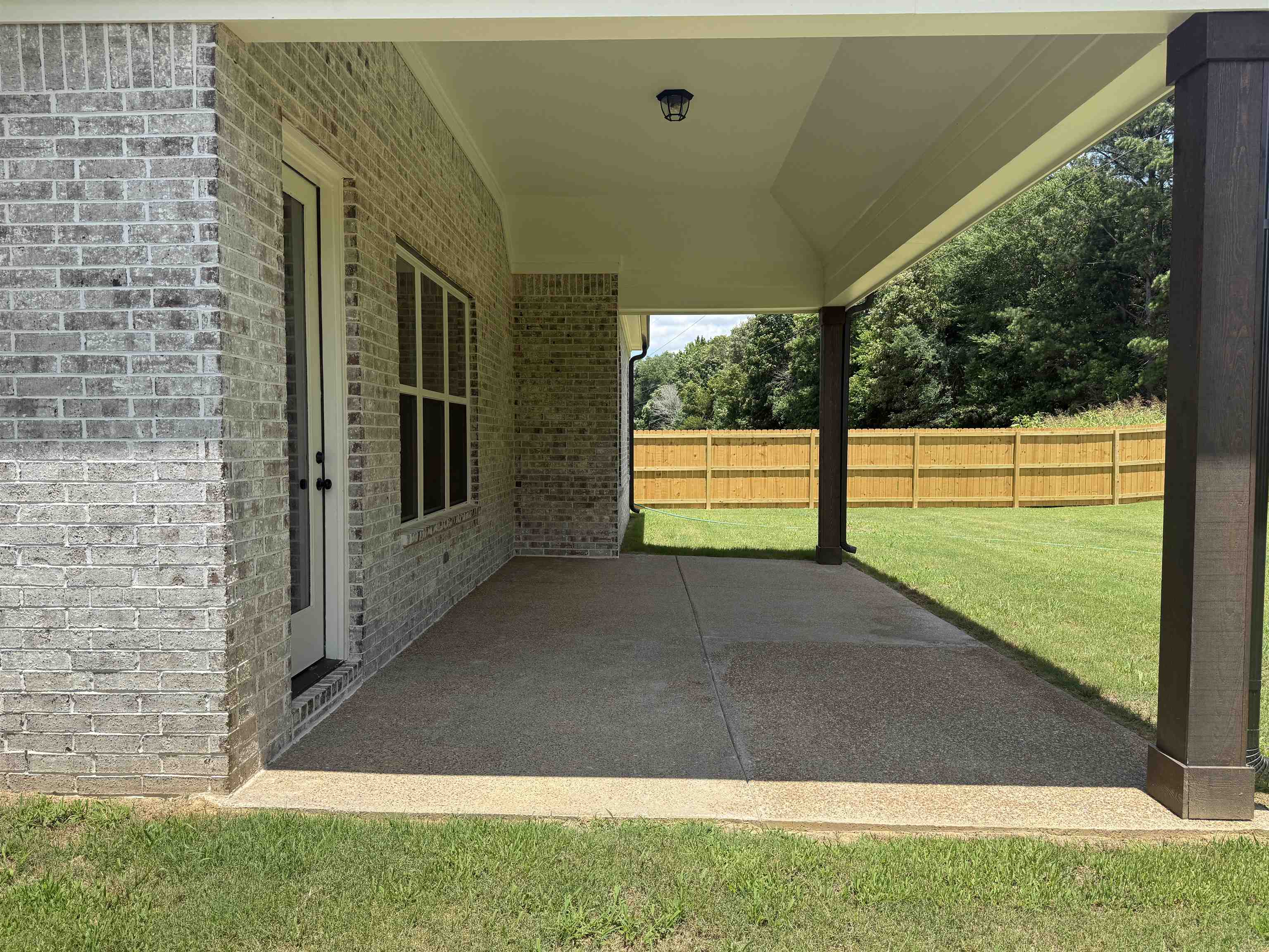 85 Ridgefield Drive Oakland, TN 38060 - Photo 9 of 12 a view of an outdoor space and a yard