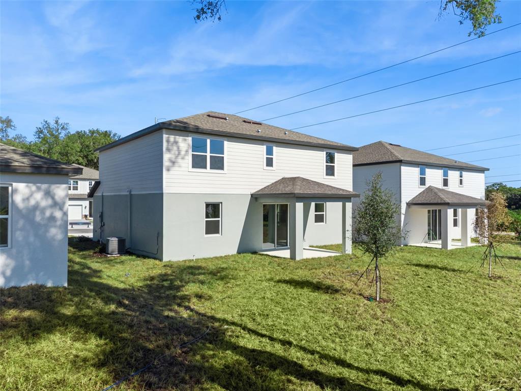 4295 Darby Court Eustis, FL 32736 - Photo 20 of 25 a front view of a house with a yard