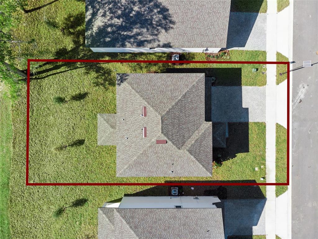 4295 Darby Court Eustis, FL 32736 - Photo 22 of 25 an aerial view of houses with yard