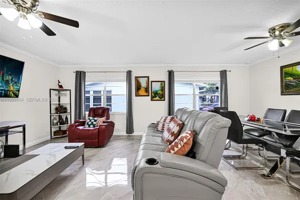 a living room with furniture and a window