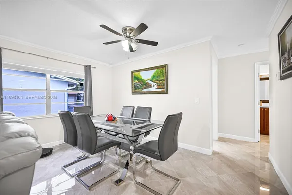 a workspace with furniture and window