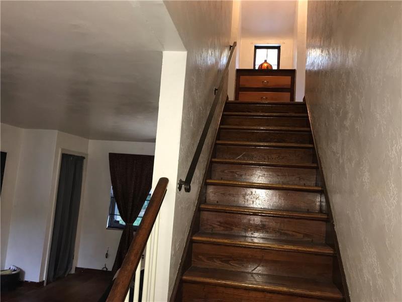 1518 Collins Road Pittsburgh, PA 15221 - Photo 14 of 25 Main Floor Hardwood Stairs to Bedrooms!