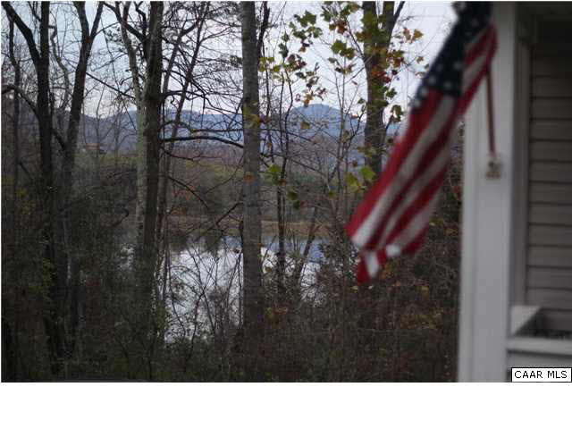 160 Greene Acres Road South Stanardsville, VA 22973 - Photo 33 of 34 Lake view through the fall foliage