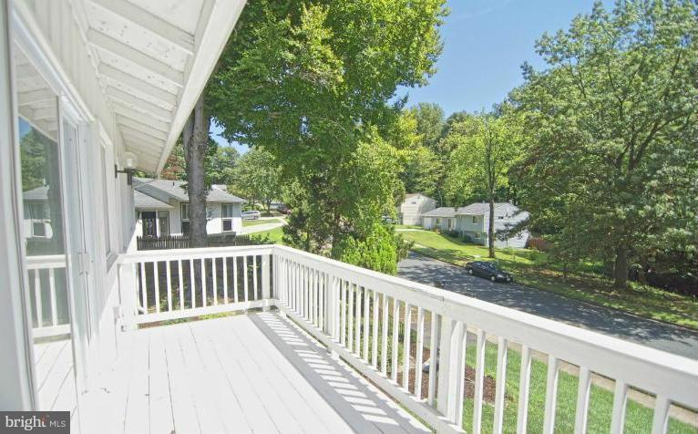 8000 Orange Plank Road Springfield, VA 22153 - Photo 3 of 30 a view of a wooden fence