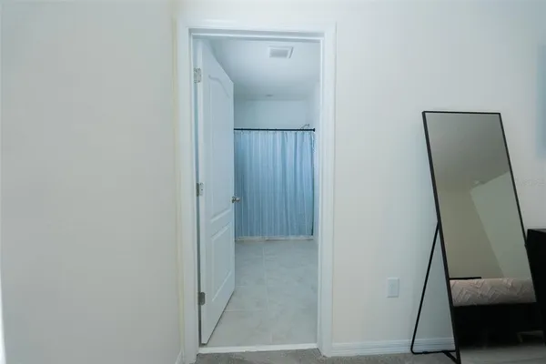 a view of a storage & utility room with window