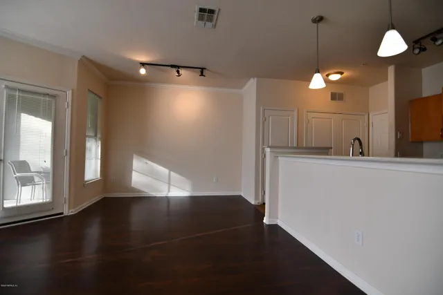a view of a hallway with entryway
