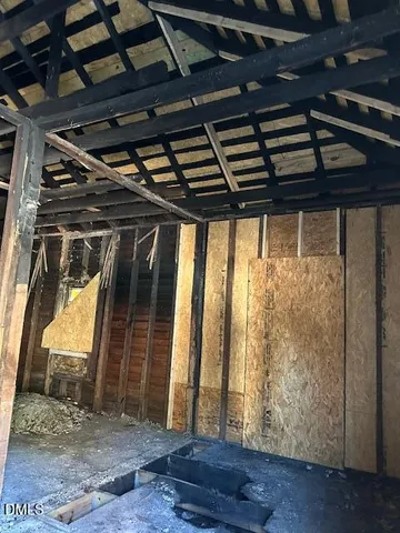 a view of porch with wooden floor