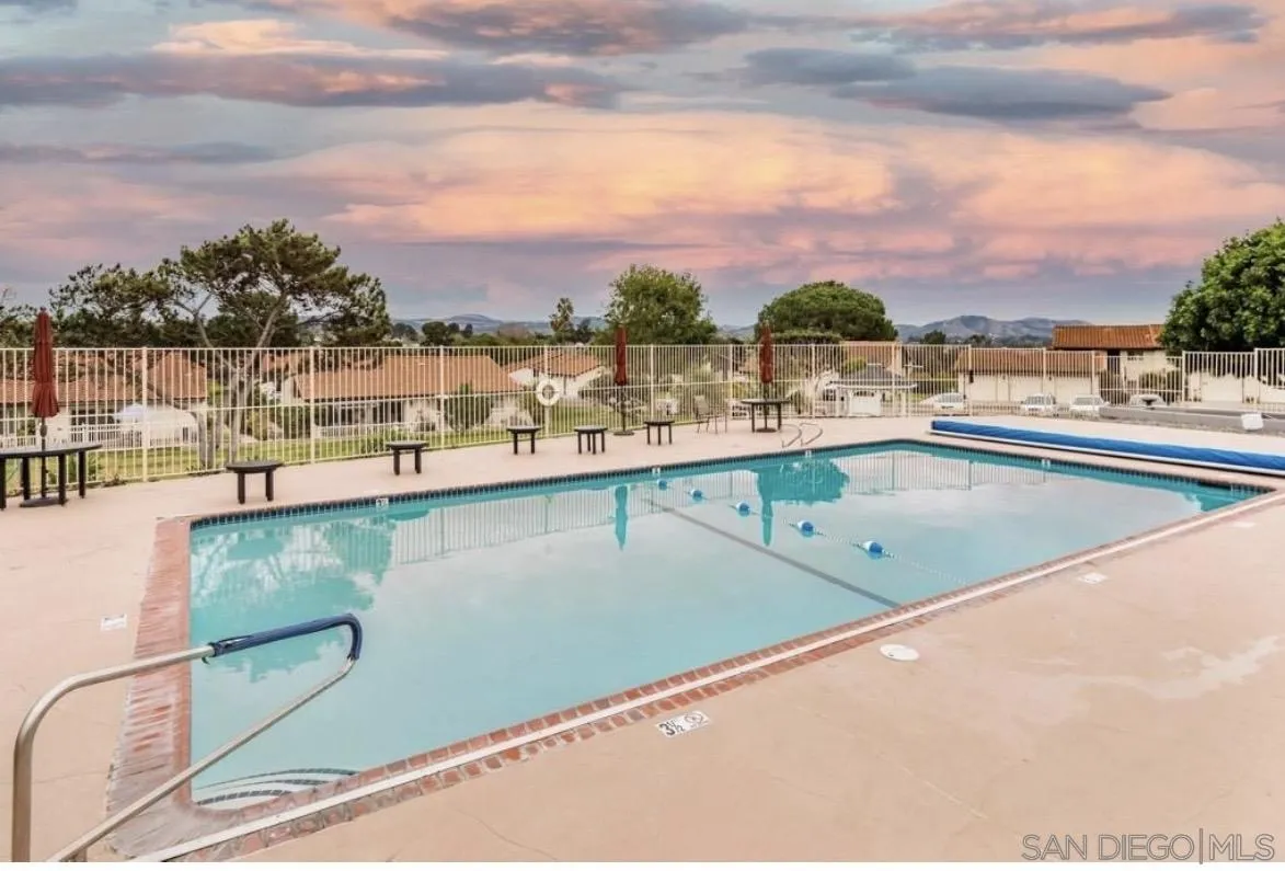 245 Fairlee Lane Encinitas, CA 92024 - Photo 14 of 18 a view of a swimming pool with a terrace
