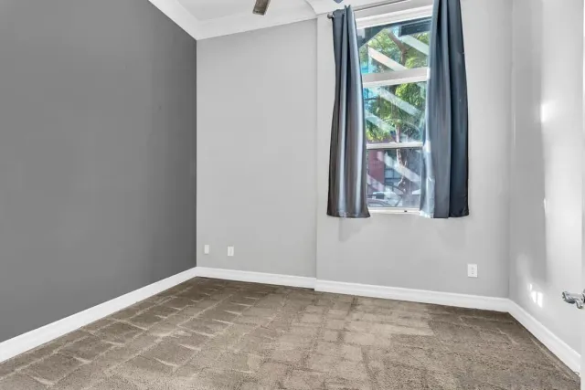 a view of an empty room and window