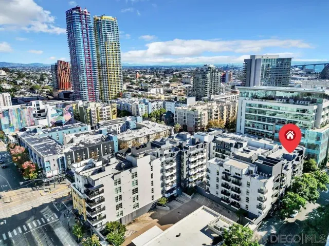 a view of a city with tall buildings