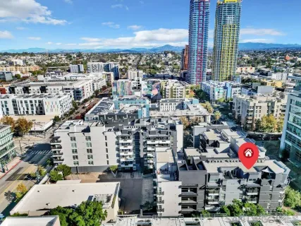 a view of a city with tall buildings