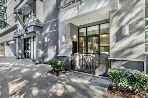 a view of a building with a tree