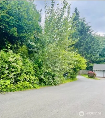 a view of a garden with an empty space