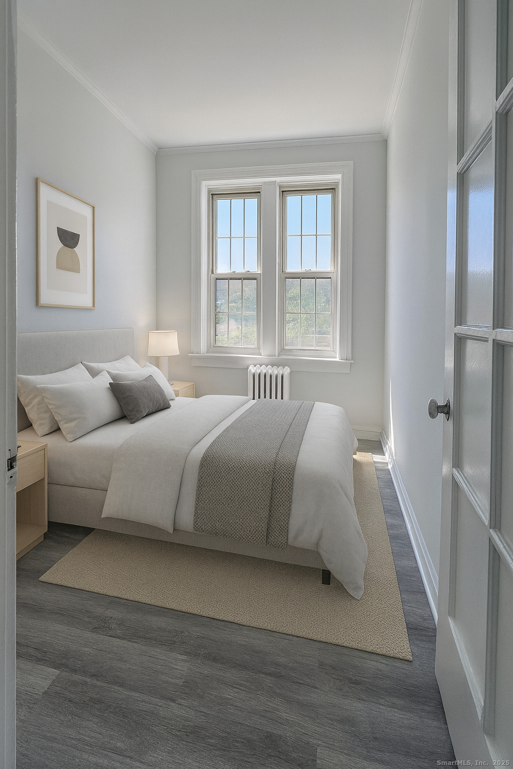 351 Greenwich Avenue, Unit 3 Greenwich, CT 06830 - Photo 5 of 8 a bedroom with a bed and a window