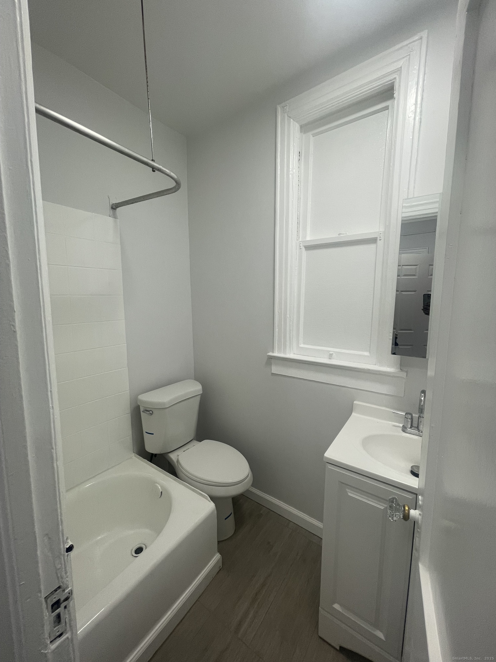 351 Greenwich Avenue, Unit 3 Greenwich, CT 06830 - Photo 7 of 8 a bathroom with a sink toilet and shower