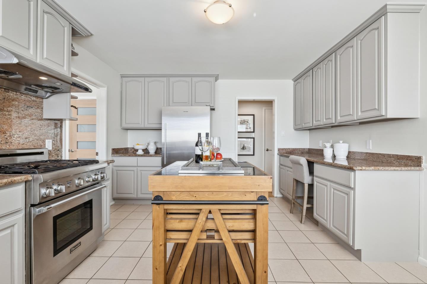86 Cliffside Drive Daly City, CA 94015 - Photo 15 of 50 a kitchen with a stove a sink and a refrigerator