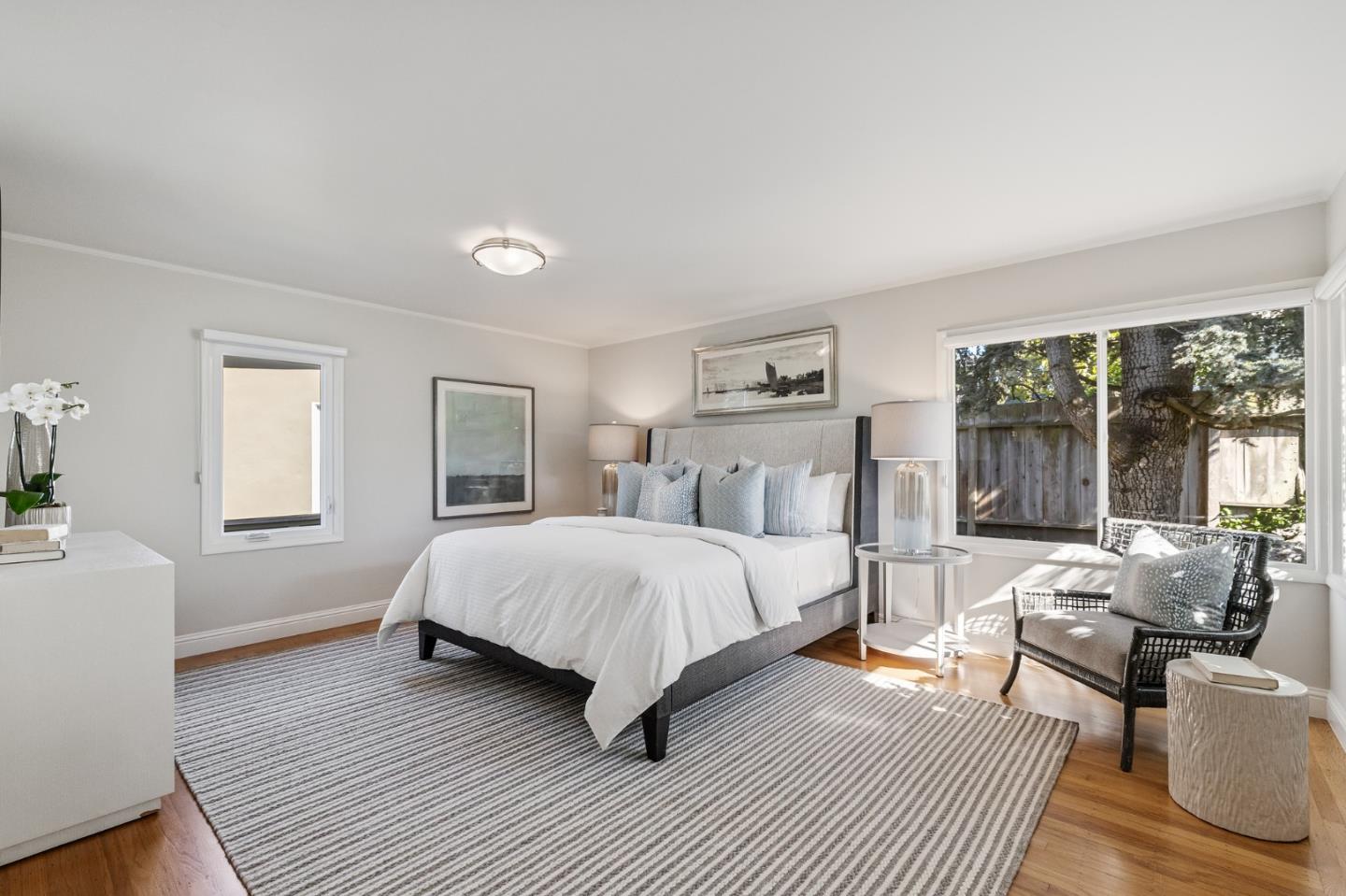 86 Cliffside Drive Daly City, CA 94015 - Photo 35 of 50 a bedroom with a bed wooden floor and windows