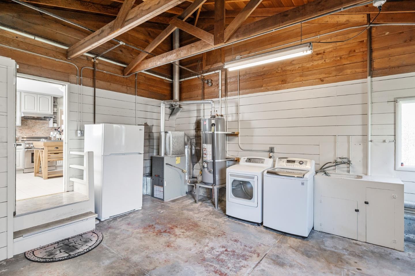 86 Cliffside Drive Daly City, CA 94015 - Photo 45 of 50 a utility room with dryer and washer