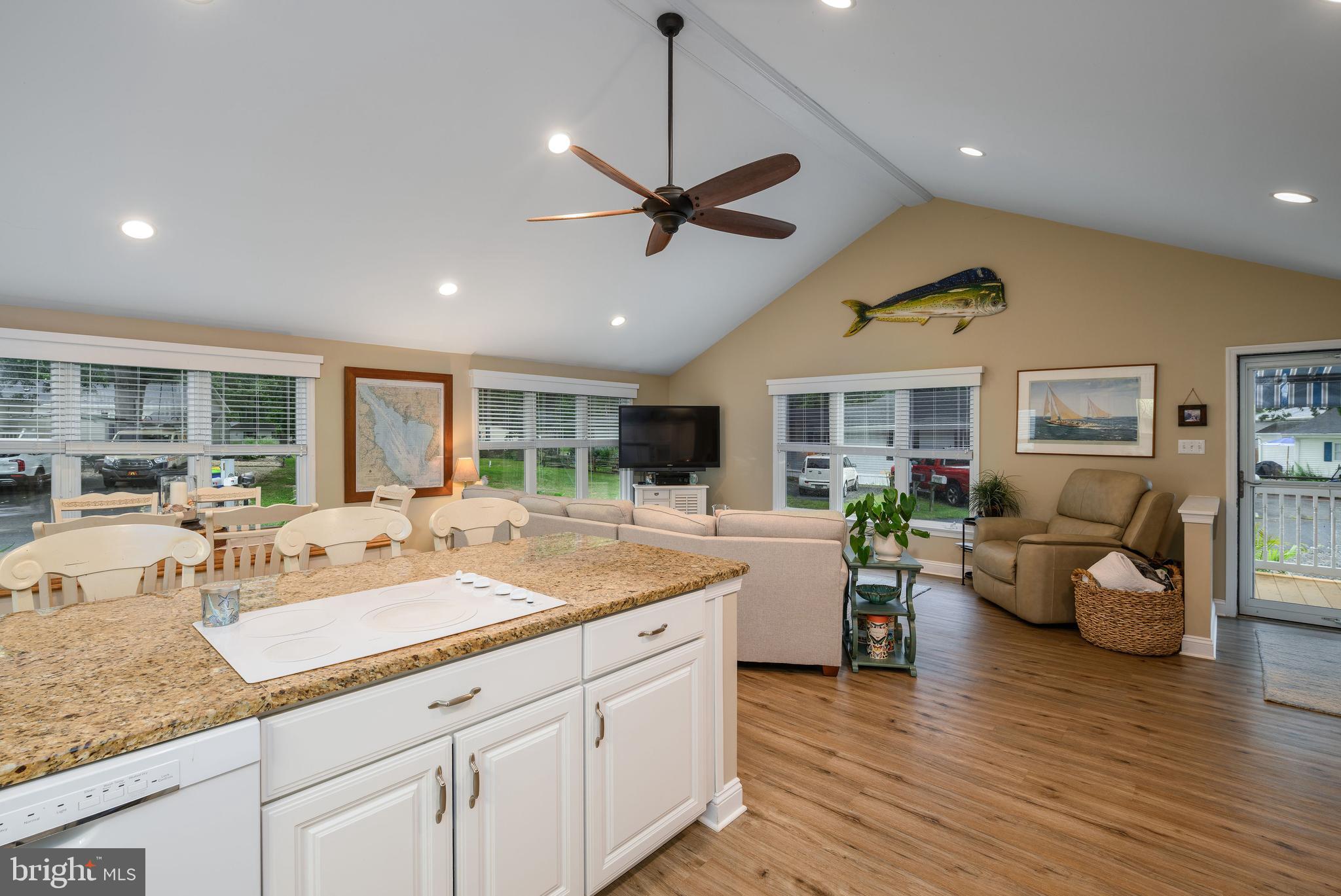 34386 Mallard Road, Unit 482 Long Neck, DE 19966 - Photo 15 of 41 a view of living room filled with furniture and wooden floor