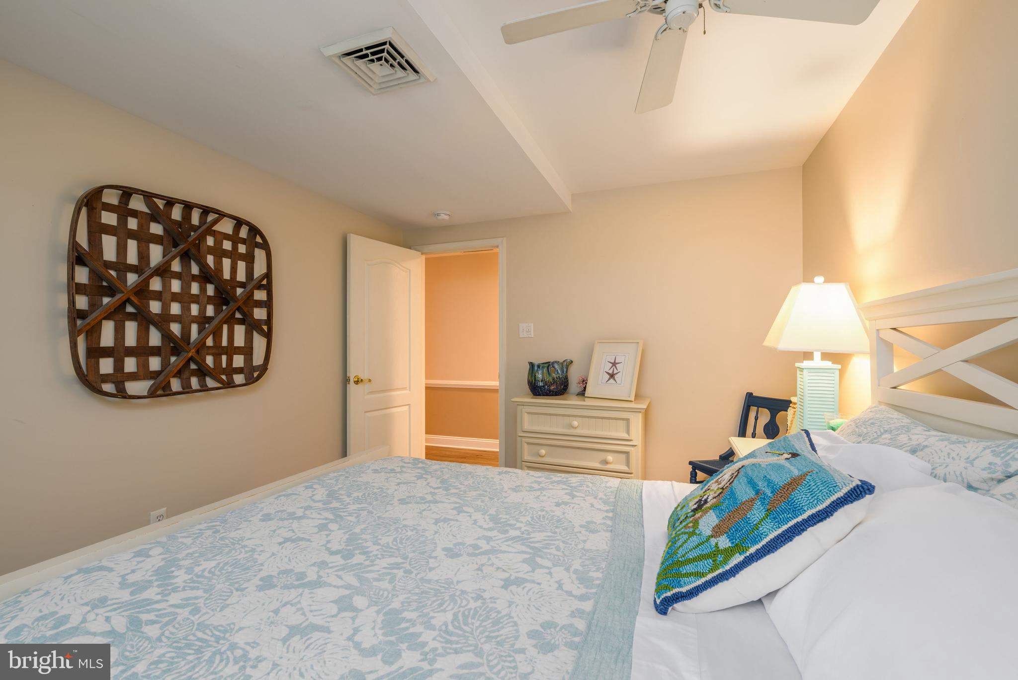 34386 Mallard Road, Unit 482 Long Neck, DE 19966 - Photo 19 of 41 a bedroom with furniture and a window