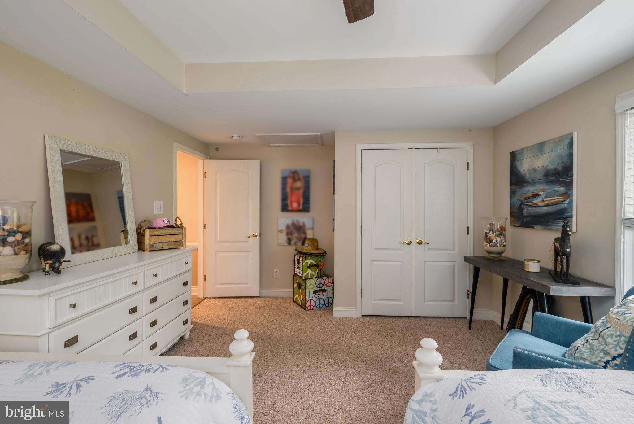 34386 Mallard Road, Unit 482 Long Neck, DE 19966 - Photo 25 of 41 a living room with furniture and a flat screen tv