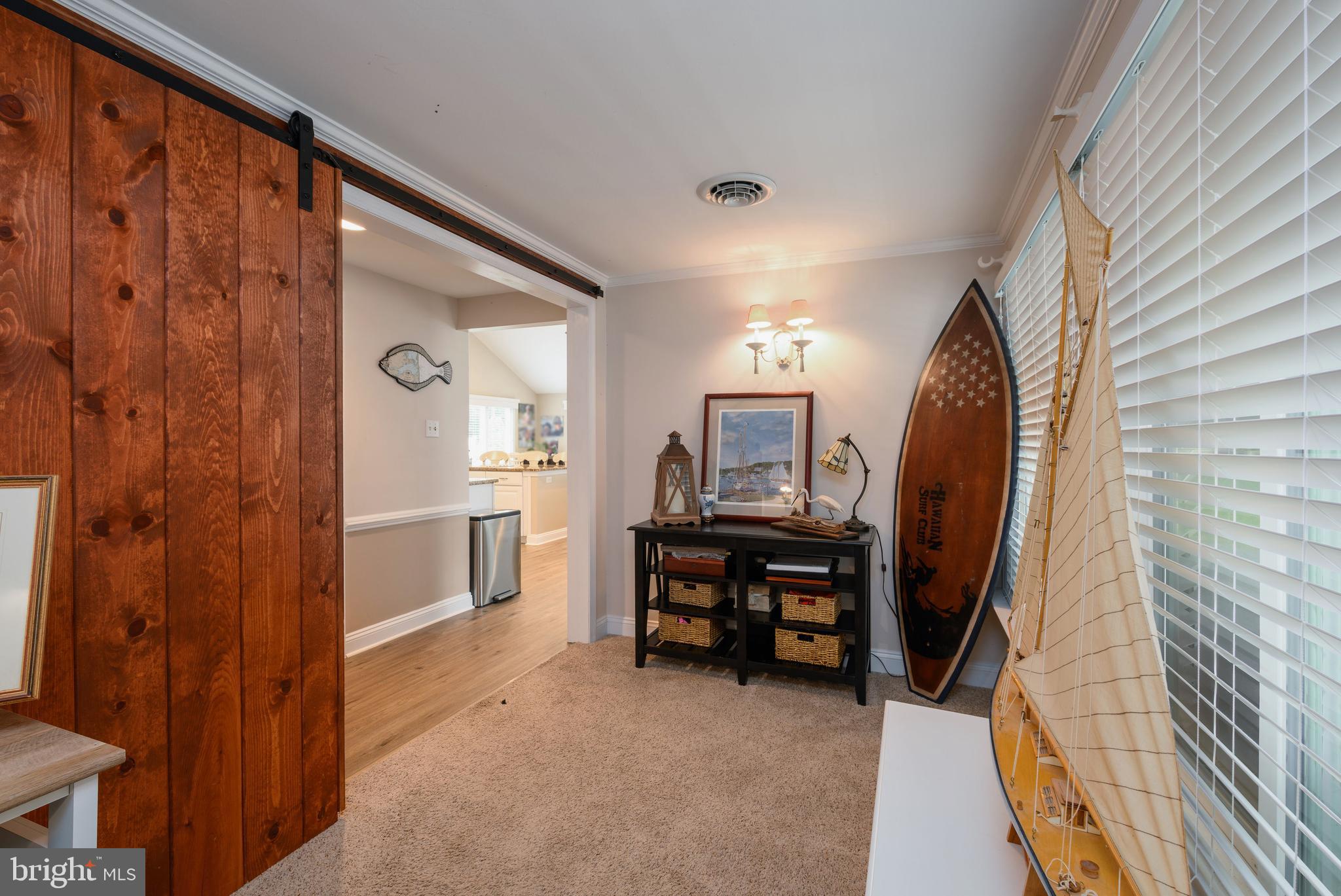 34386 Mallard Road, Unit 482 Long Neck, DE 19966 - Photo 26 of 41 a view of a bedroom from a balcony