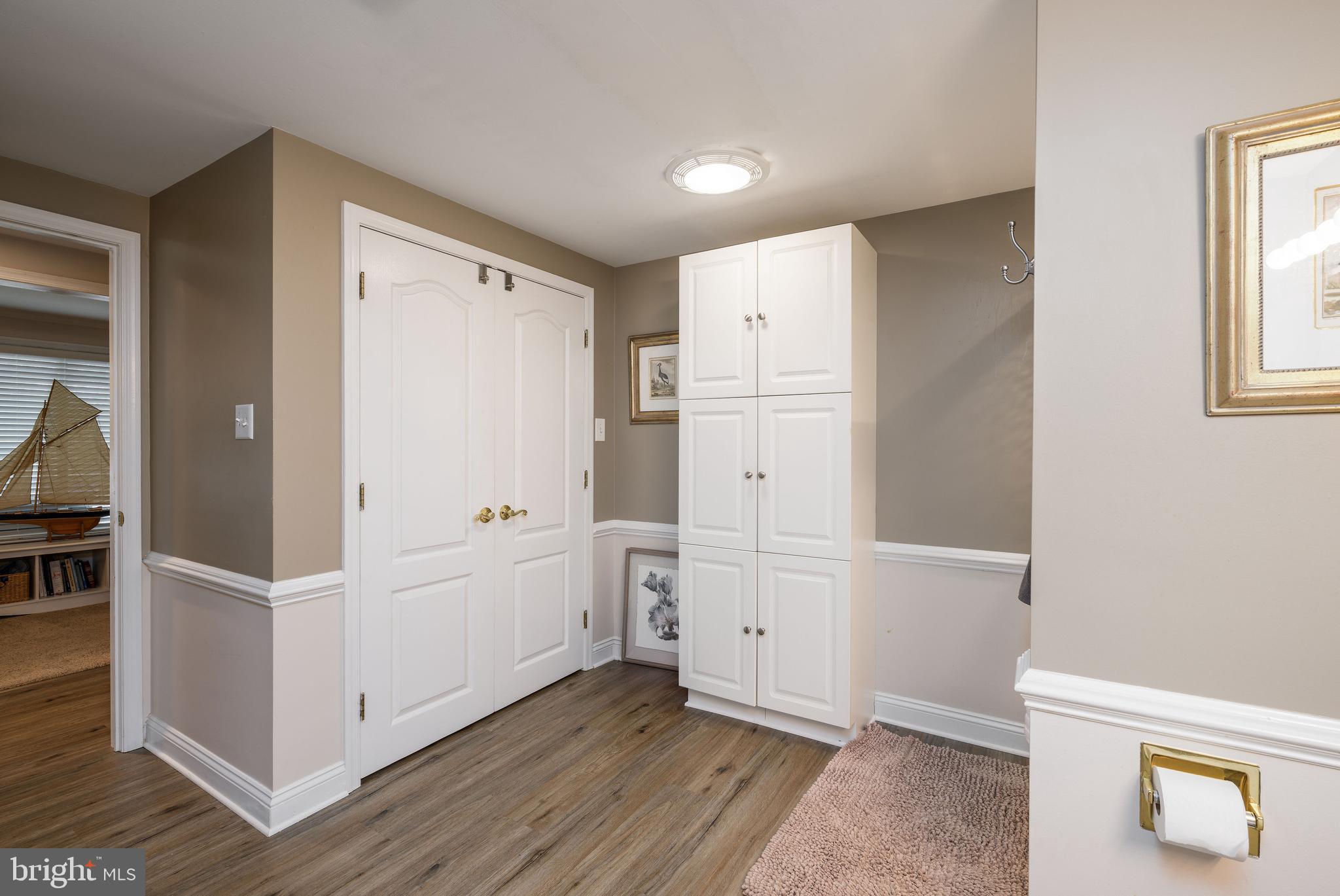 34386 Mallard Road, Unit 482 Long Neck, DE 19966 - Photo 29 of 41 a view of kitchen with furniture and wooden floor